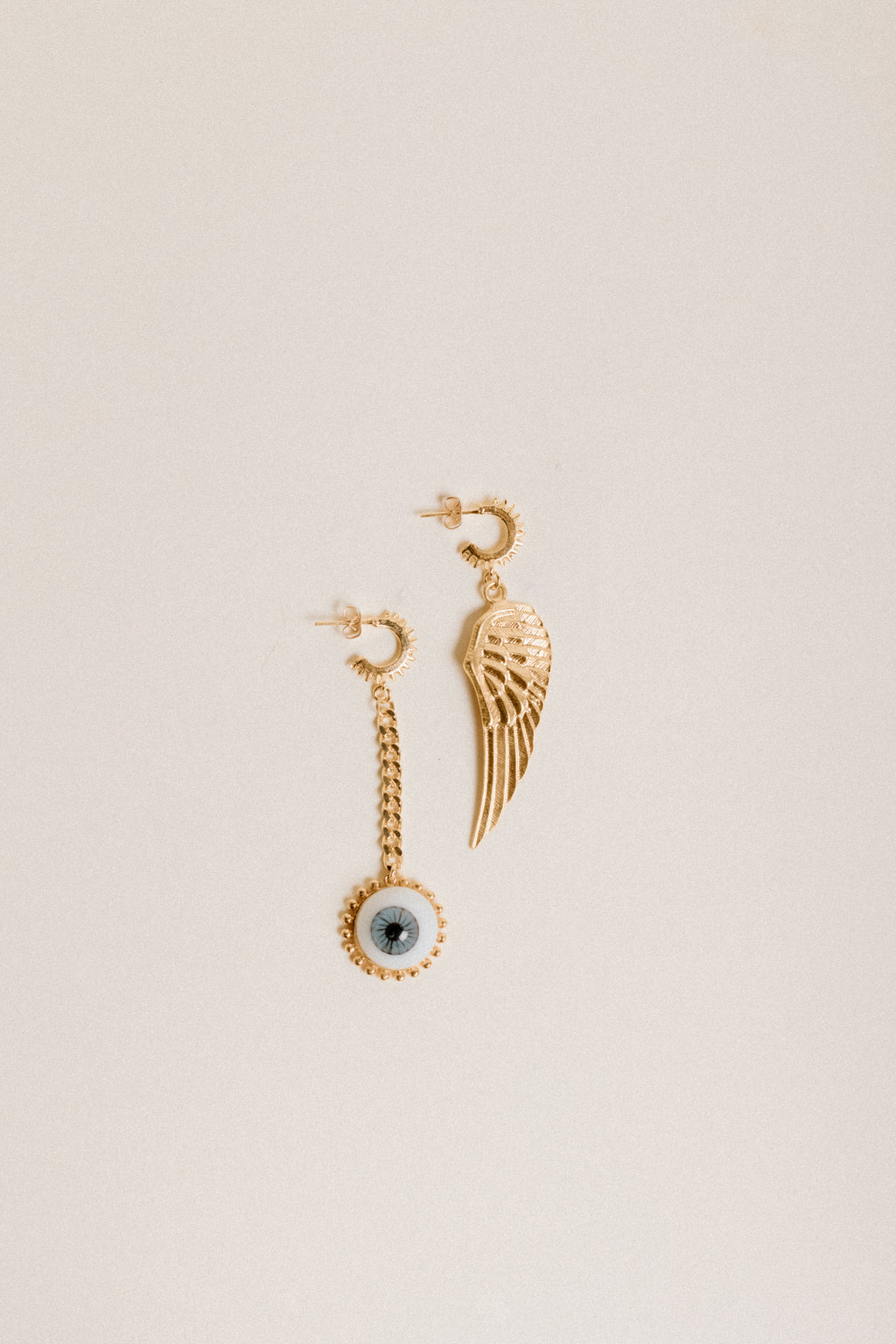 Aretes Ala y Ojo