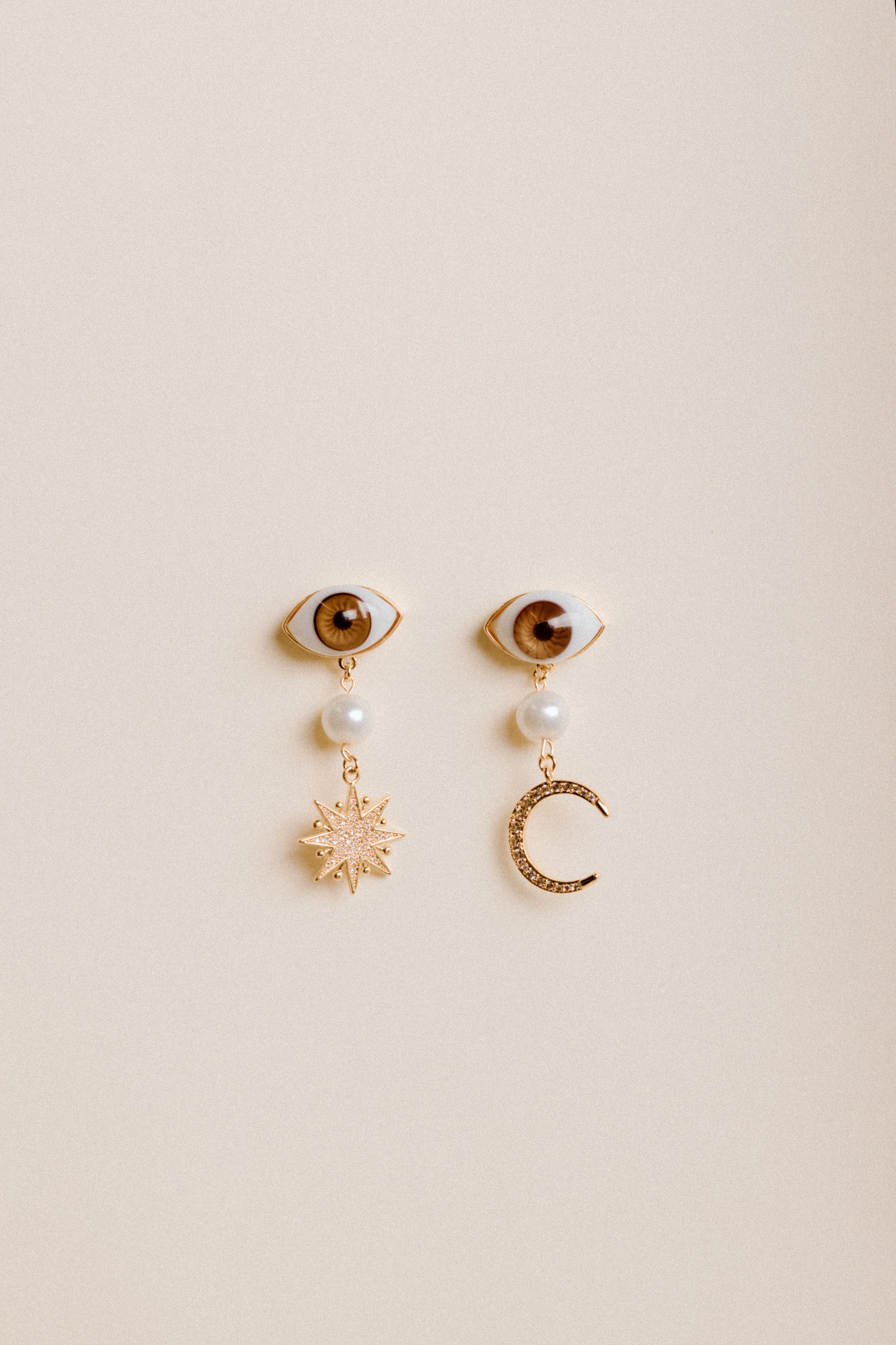 Aretes Luna y Sol Ojo Cafe